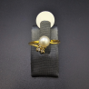 Sortija de oro con circonitas y perla