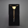 Pulsera doble corazón de oro.